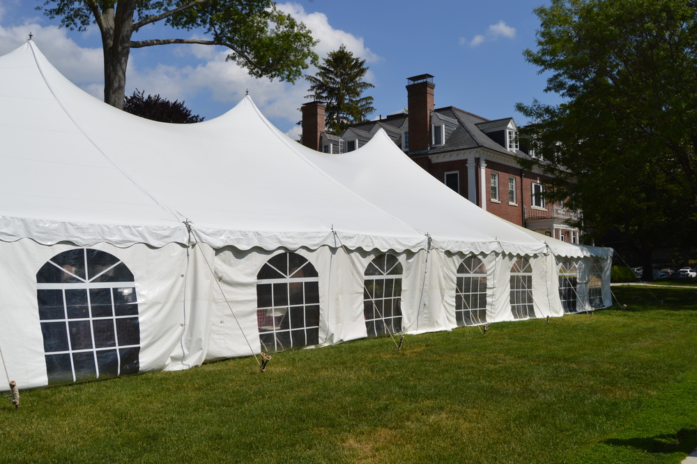 a large, white event tent with walls