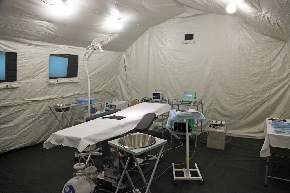 a field hospital set up in a tent