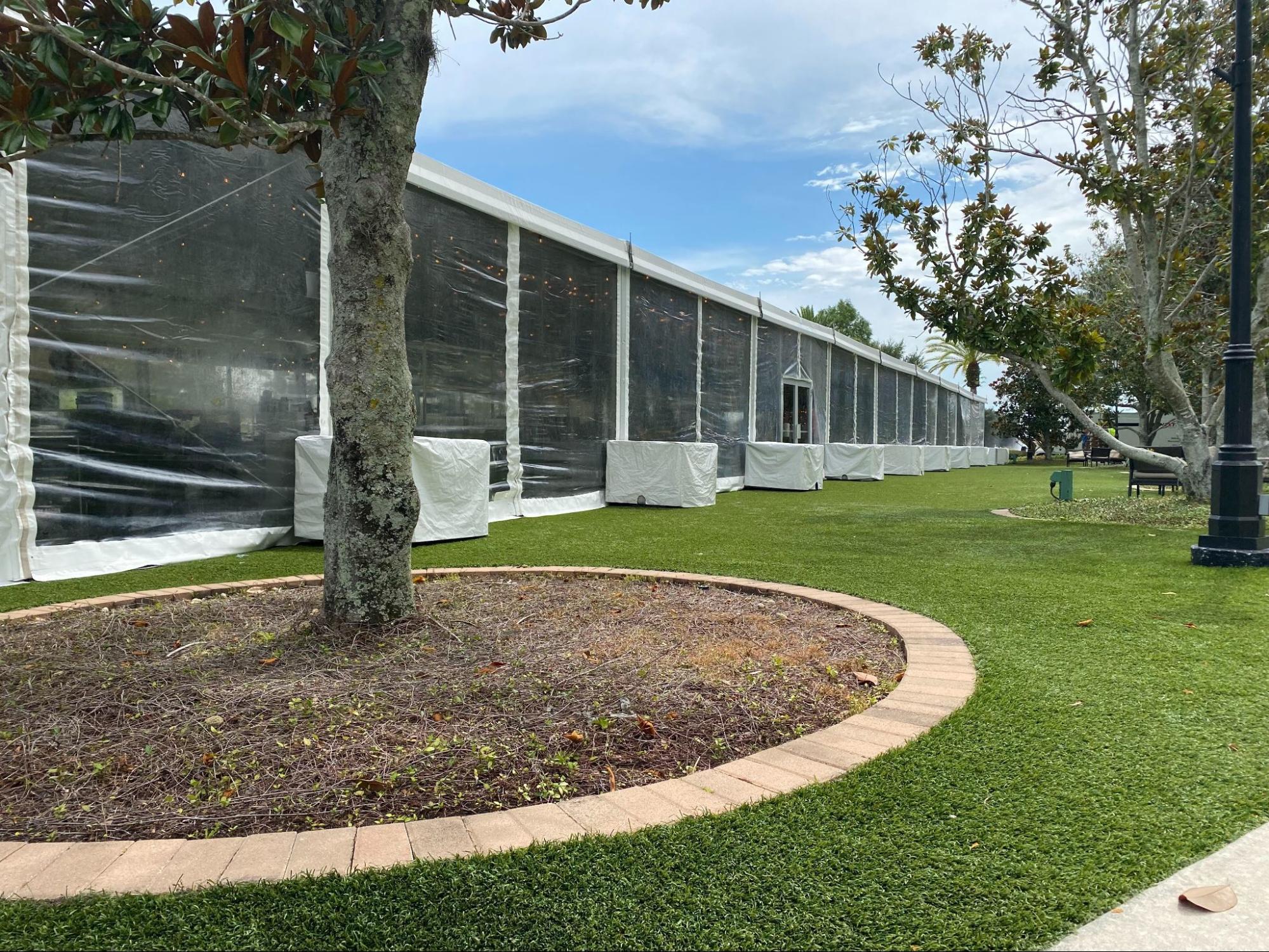 the clear sidewalls of the iRentEverything event tent at the Michelin Star event at the RItz Carlton in Orlando, Florida