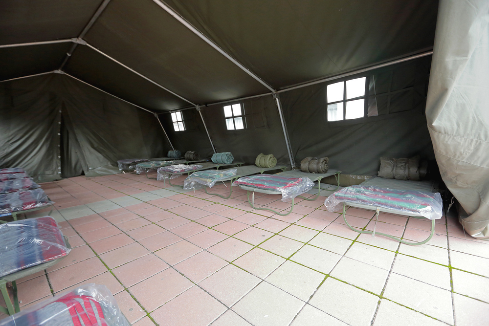 beds in a refugee tent during an emergency