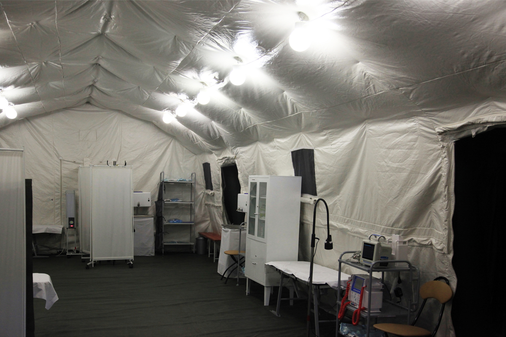 the interior of a field hospital tent