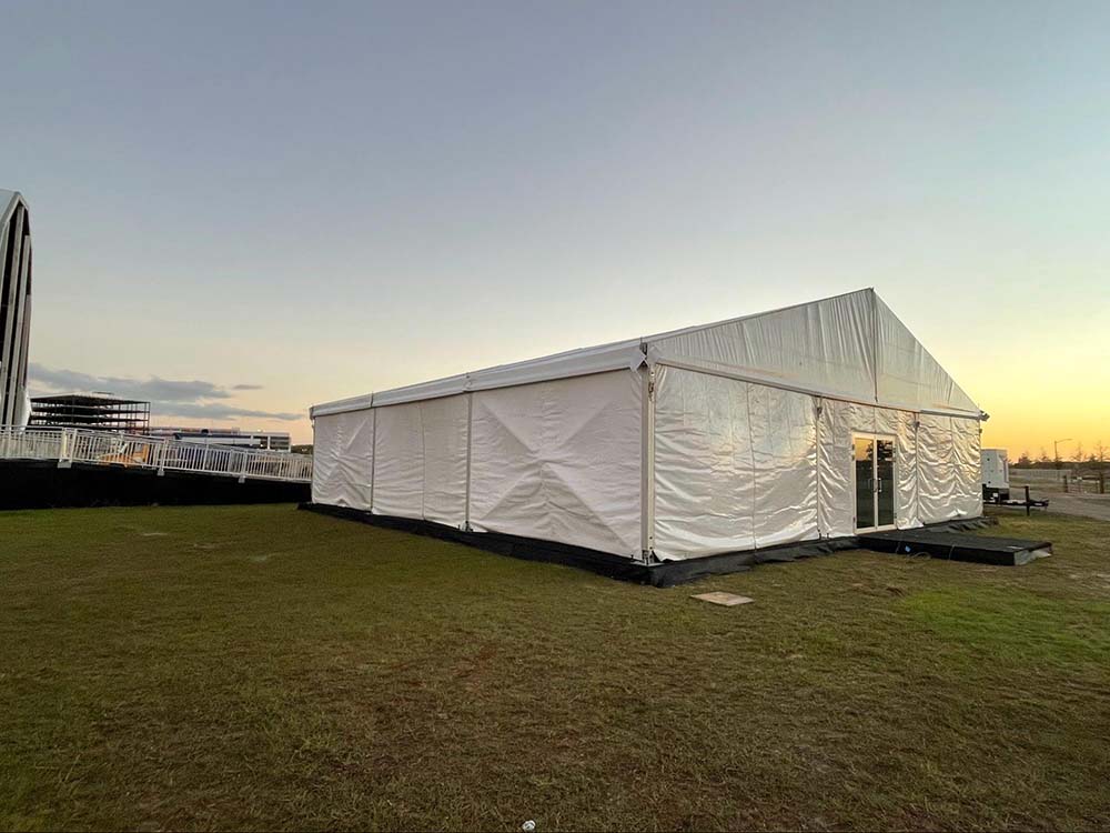 an outdoor event tent on the grounds of the Lake Nona Wave Hotel