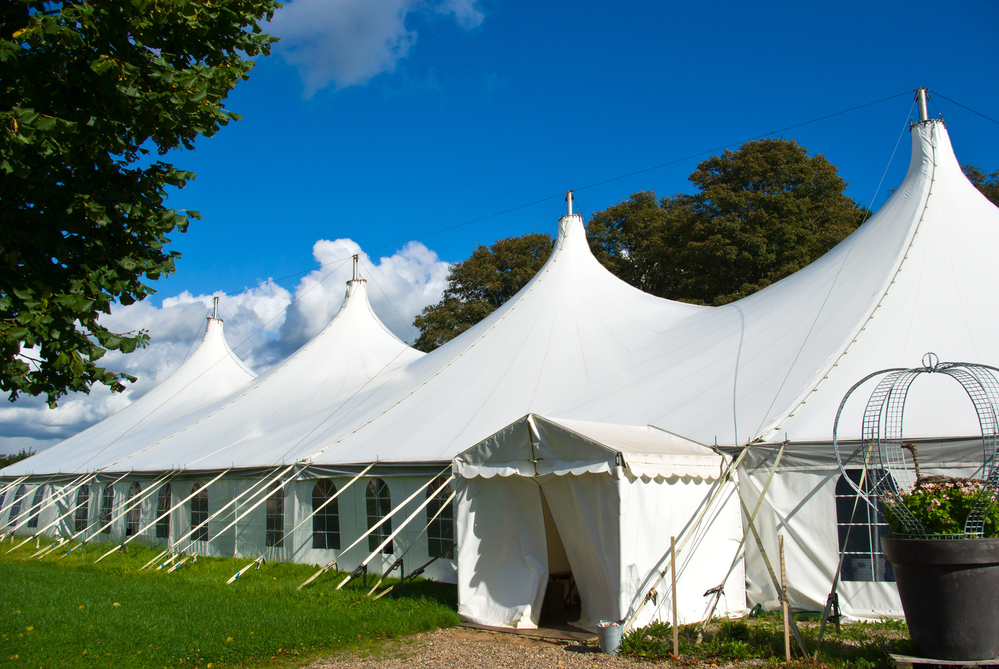 a large event tent with sidewalls and a doorway